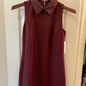 New dress with tag attached.